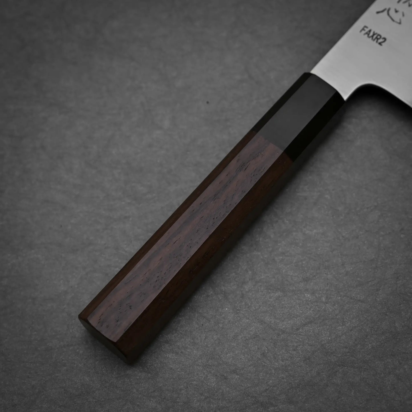 Close-up view of the handle of 210mm Hatsukokoro FAXR2 gyuto knife