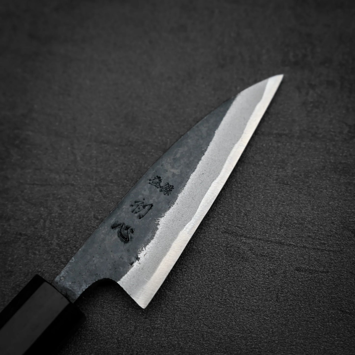Close up view of the front side of Hatsukokoro kurouchi aogami#2 petty knife