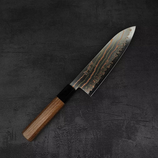 Top down view of Hatsukokoro Habayusa aogami#2 rainbow damascus santoku knife