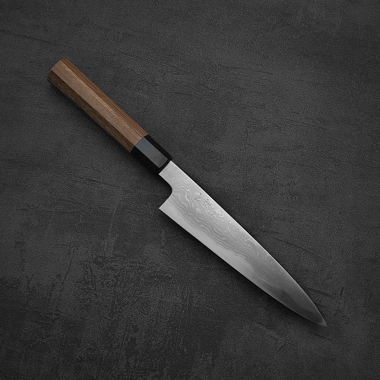 Angled view of Hatsukokoro Komorebi damascus aogami#1 petty knife
