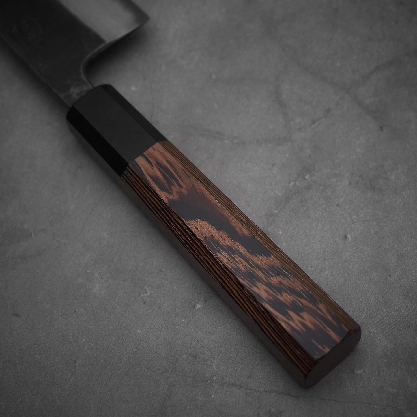 Close up view of the handle of Hatsukokoro Kumokage gyuto knife