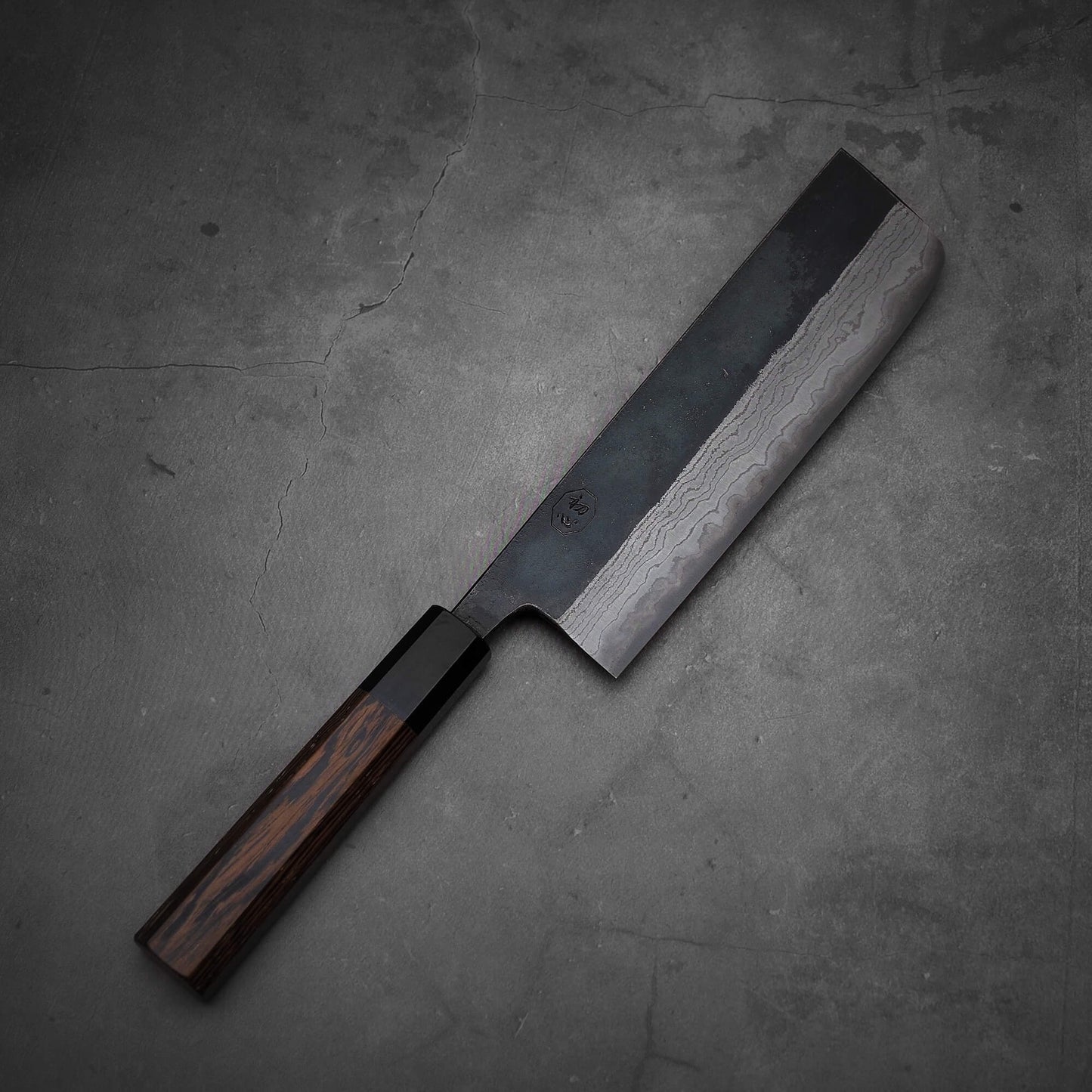 Top view of Hatsukokoro Kumokage kurouchi damascus aogami#2 nakiri knife