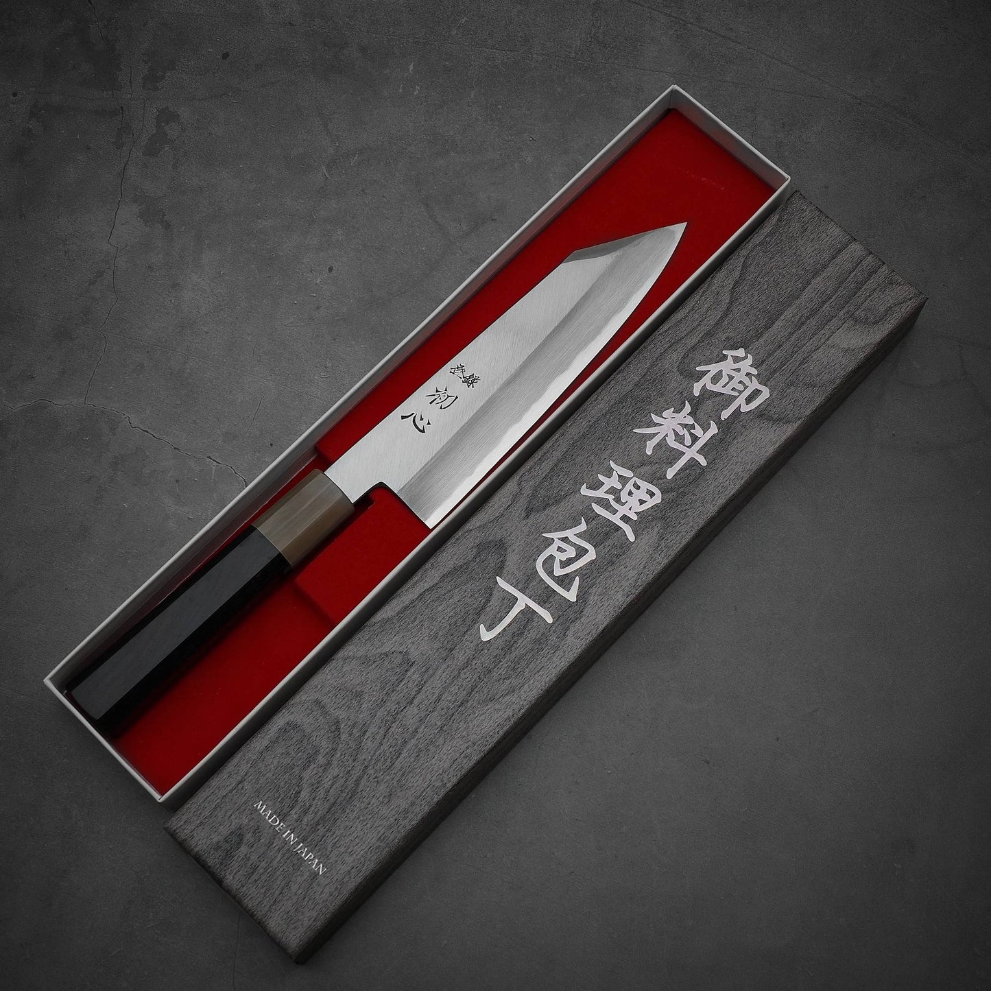 Top down view of Nakagawa bunka with aogami#1 steel. This Japanese knife is sharpened by Morihiro hamono. Knife is inside its box