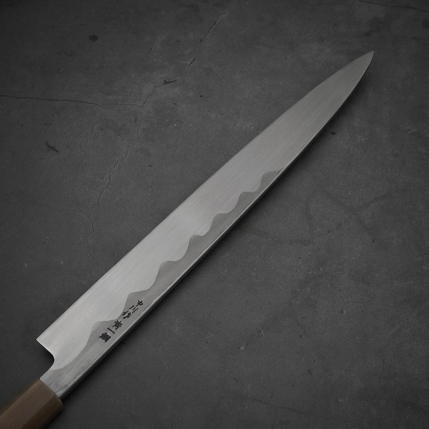Close up view of the back side of Nakagawa yanagiba with aogami#1 steel. This sushi knife is sharpened by Morihiro hamono.