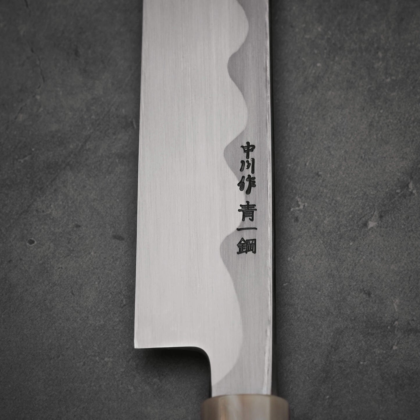 Close up view of the kanji of Nakagawa 300mm yanagiba with aogami#1 steel. This sushi knife is sharpened by Morihiro hamono.