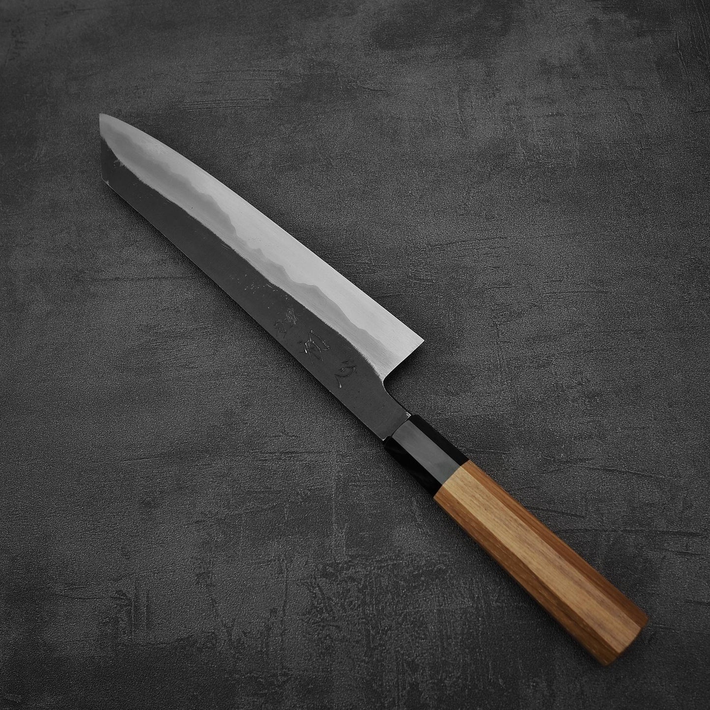 Top down view of Hatsukokoro Yoake kurouchi aogami#1 kiritsuke gyuto knife
