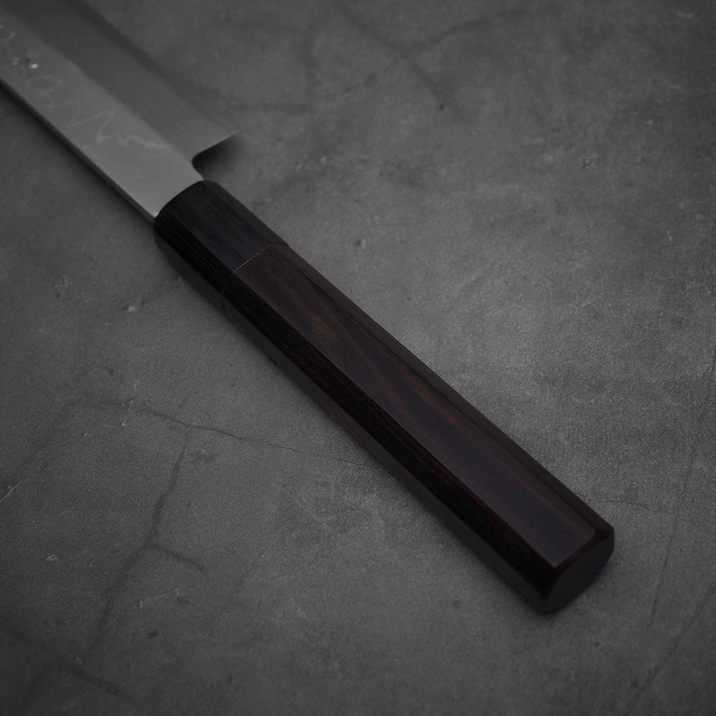 Top view of the octagonal ebony handle of Hideo Kitaoka damascus shirogami#2 yanagiba 270mm