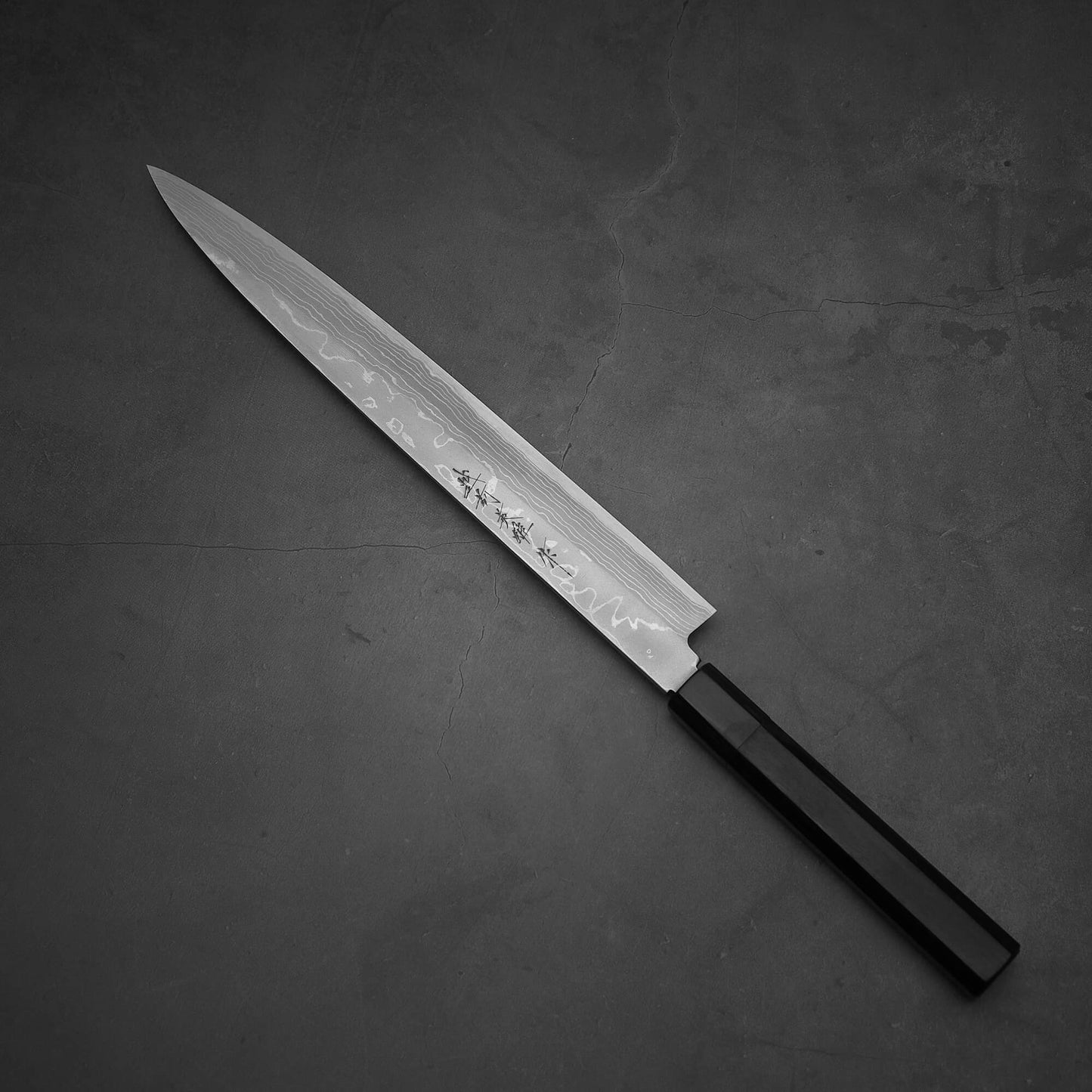 Diagonal top view of the Hideo Kitaoka damascus shirogami#2 yanagiba 270mm