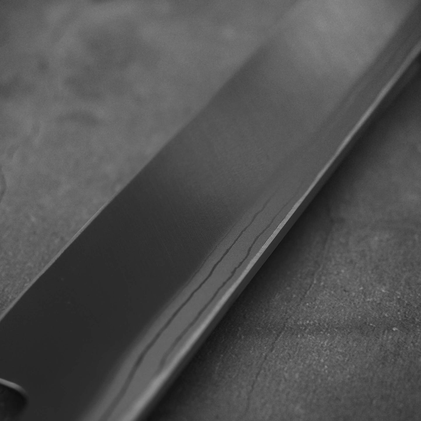Close up of the urasuki of Hideo Kitaoka damascus shirogami#2 yanagiba 270mm