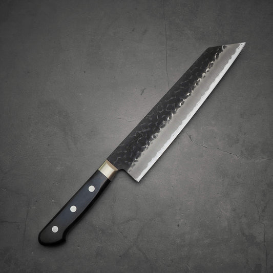 Top view of Ittosai Kotetsu tsuchime kurouchi aogami super kiritsuke gyuto