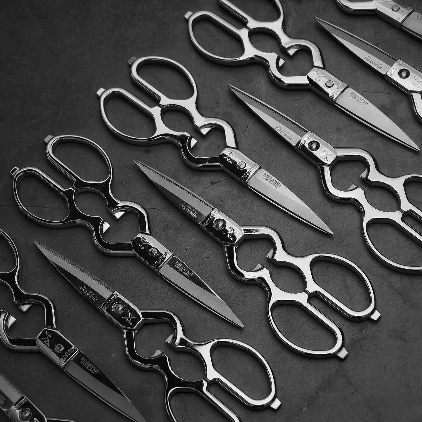 Top down view of several Mimatsu 200mm kitchen shears: Japan-made all-stainless, durable shears for a variety of kitchen tasks.