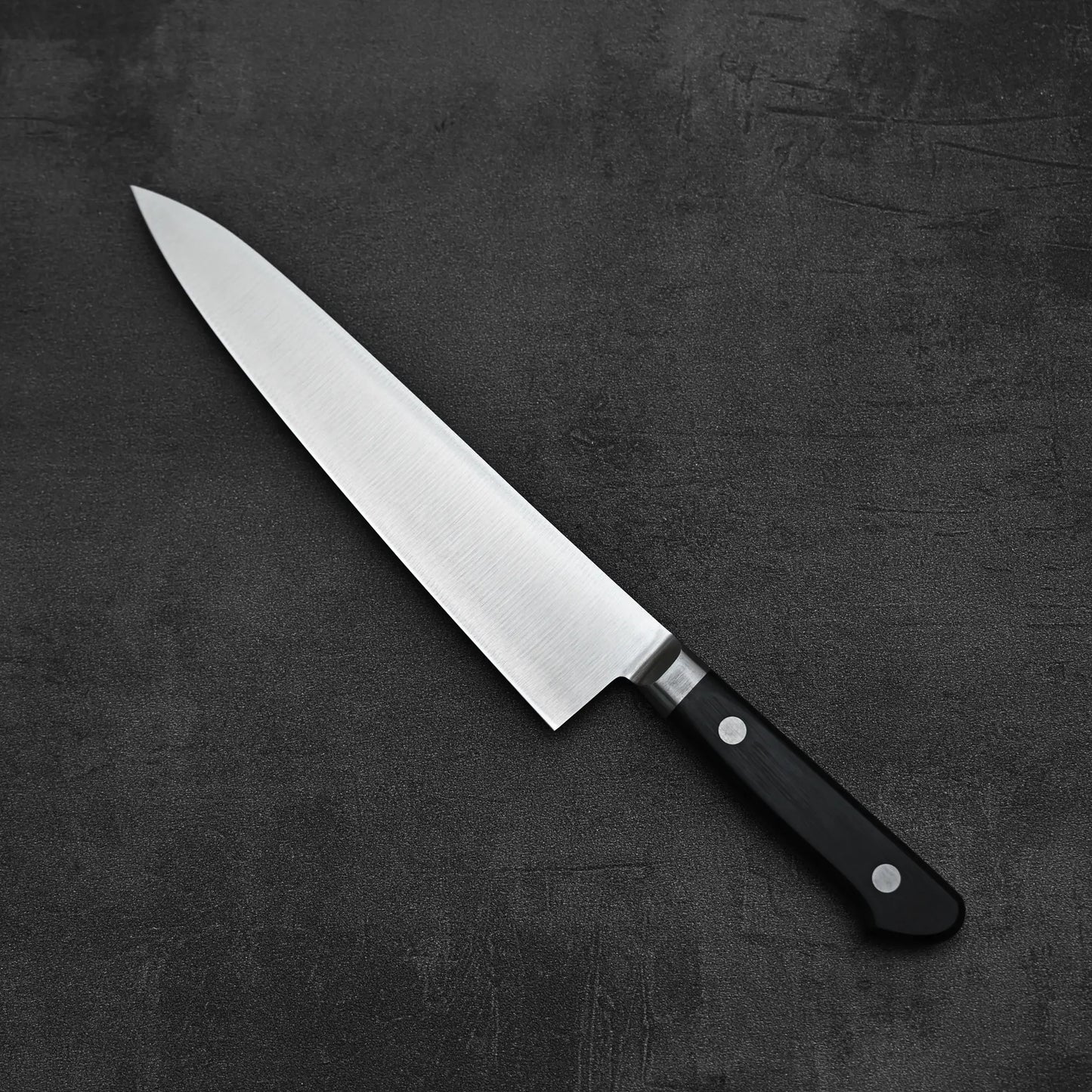 Top down view of Misono Molybdenum gyuto knife 210mm showing the back side