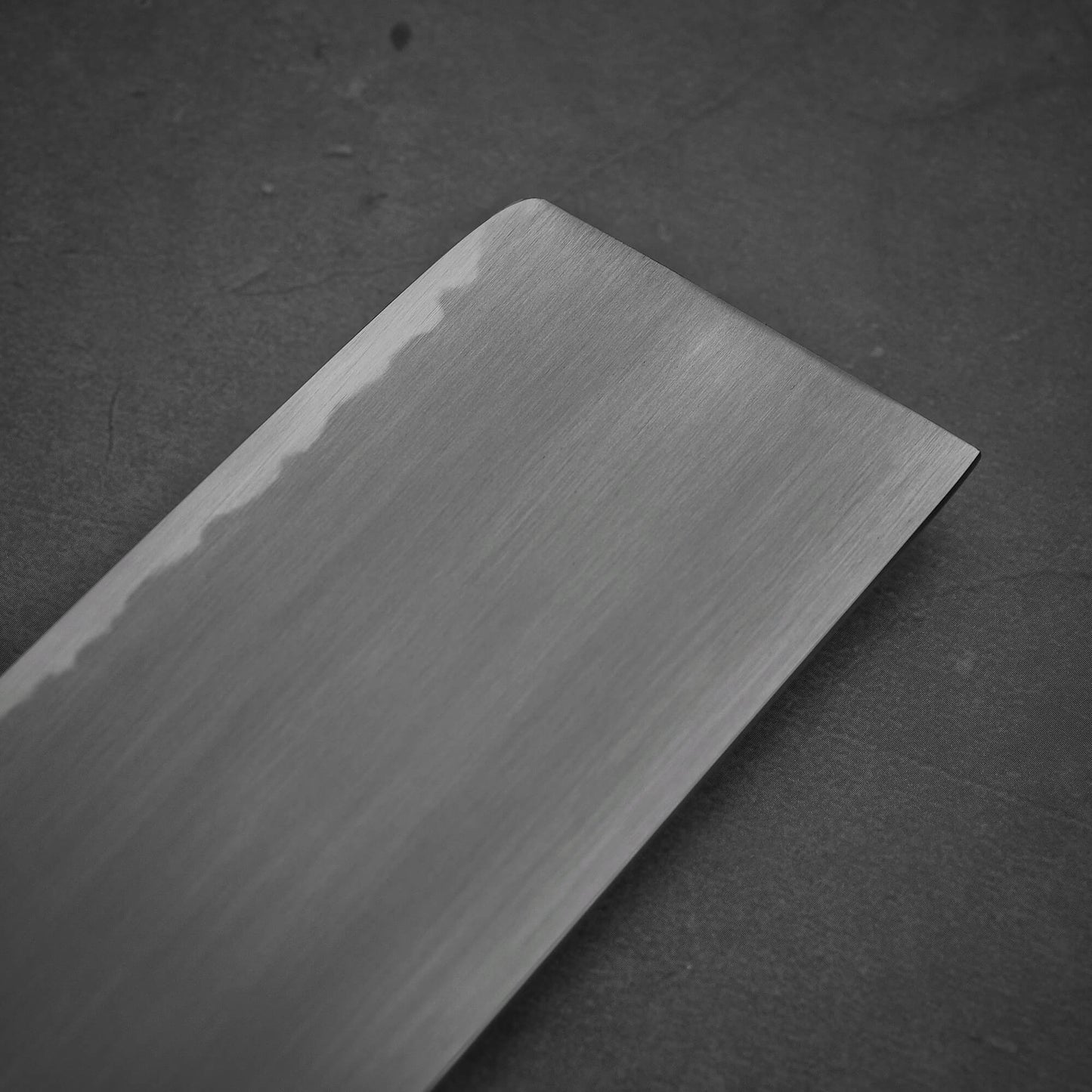 Close up view of the tip area of Nakagawa aogami#2 nakiri knife. Image shows the back side of the knife