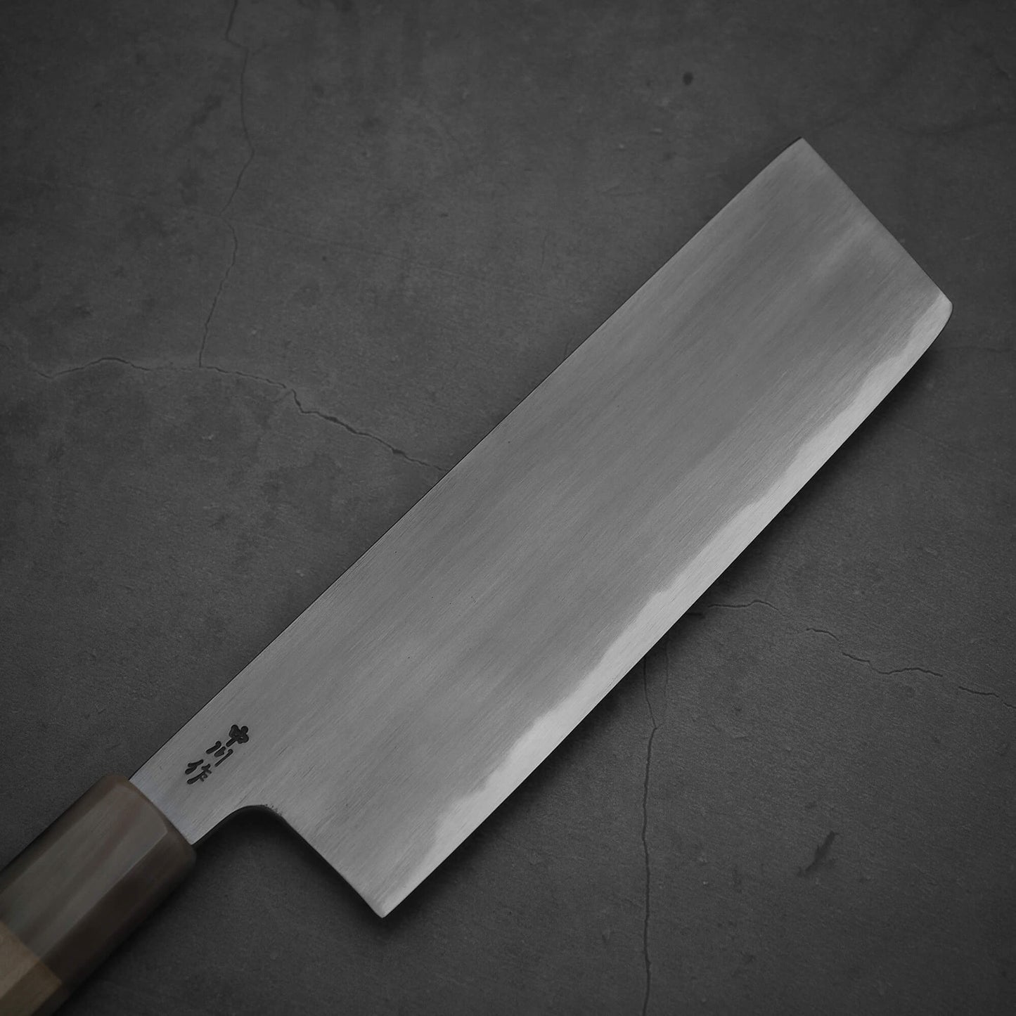 Top view of the right side of the blade of Nakagawa aogami#2 nakiri knife