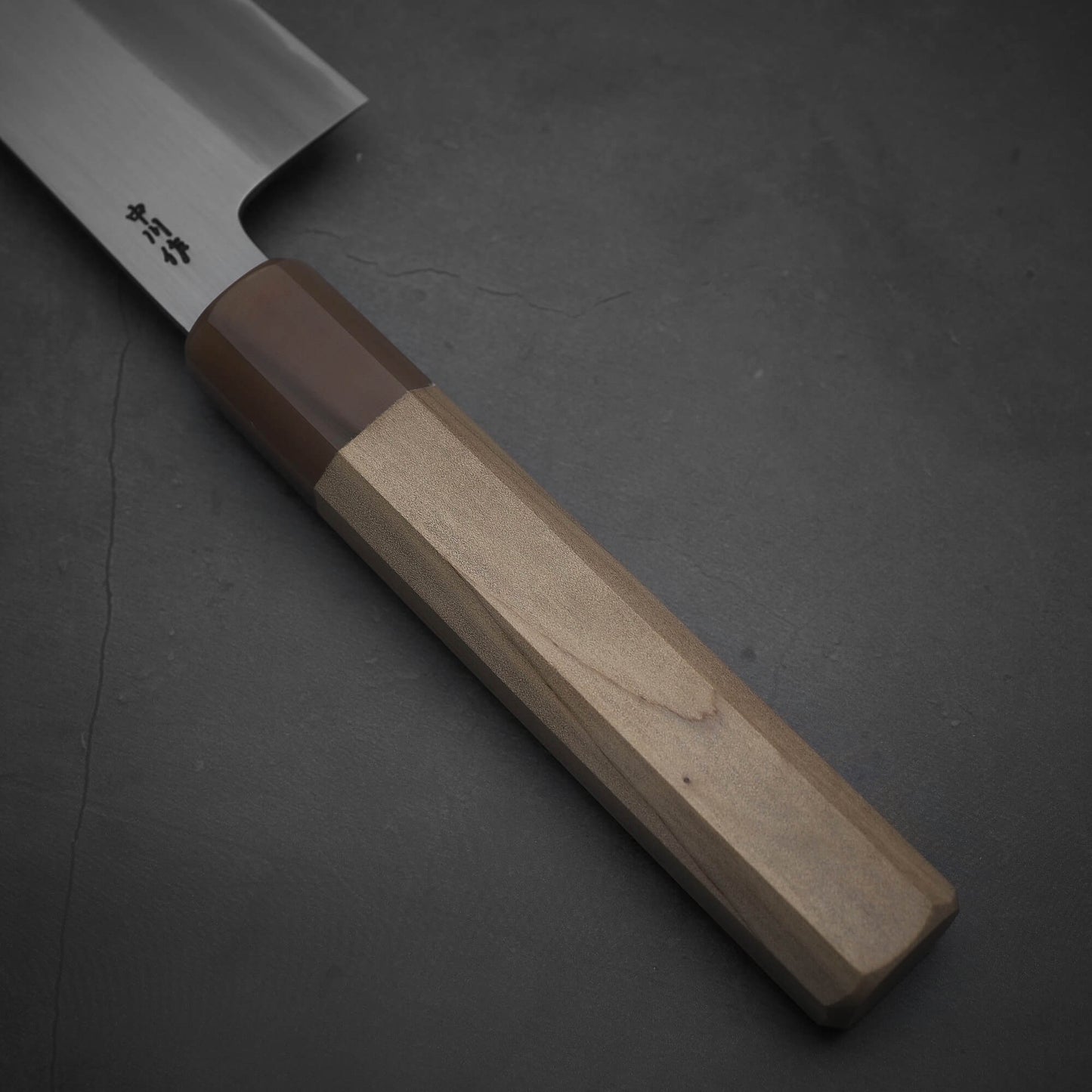 Close up view of the handle of Nakagawa shinogi aogami#2 gyuto knife
