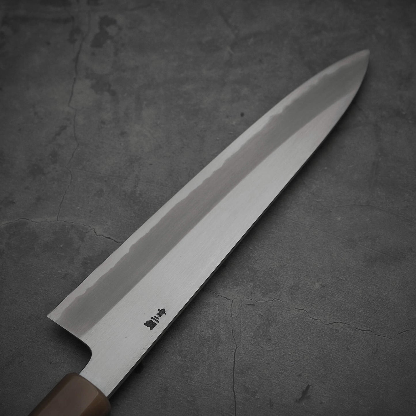 Top view of the back side of Nakagawa shinogi aogami#2 gyuto knife