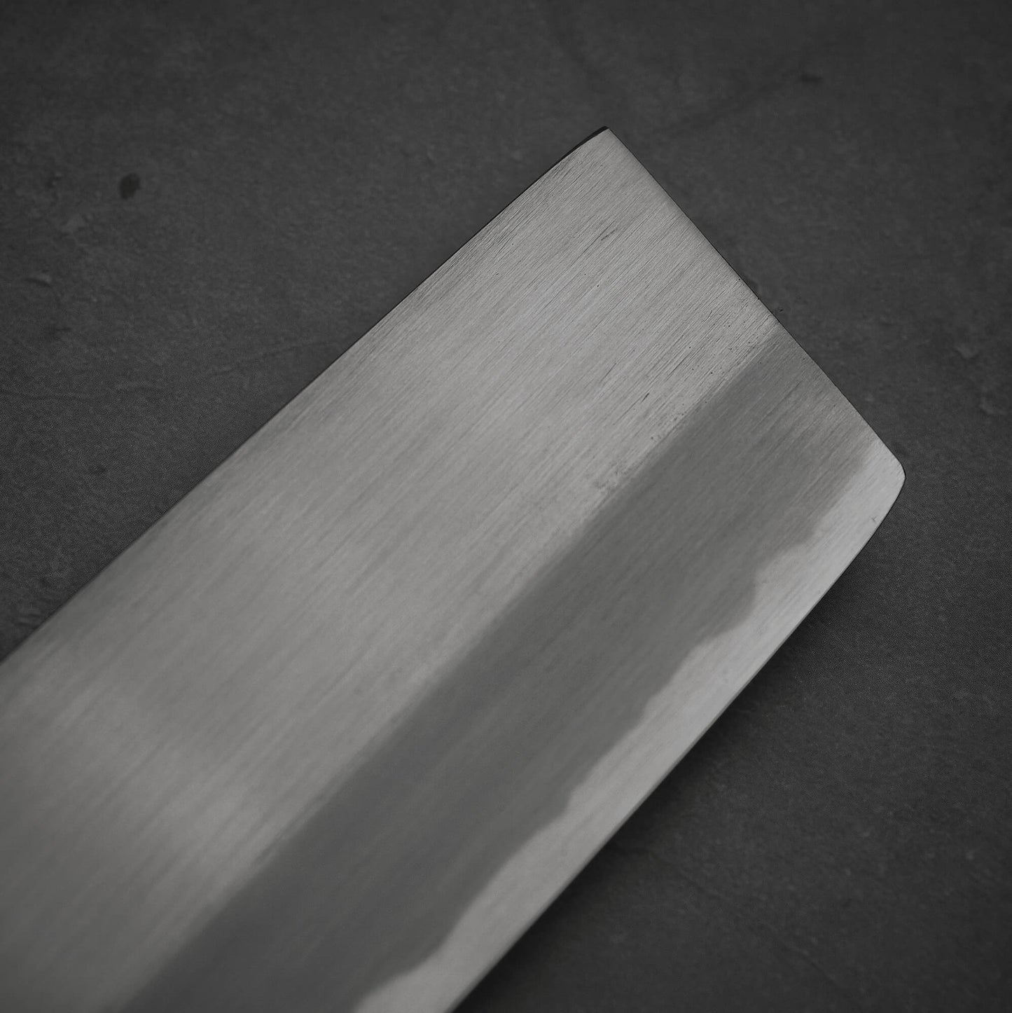 Close up view of the tip area of the Nakagawa shinogi aogami#2 nakiri knife.