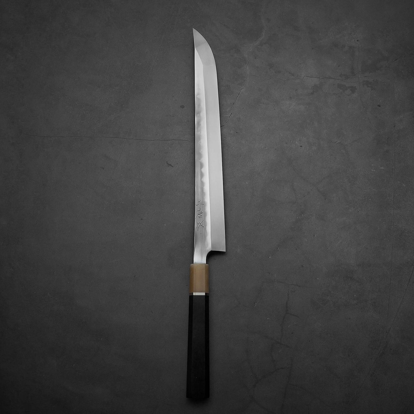 Top down view of Nigara honyaki sakimaru forged by Tsuyoshi Yoshizawa. This honyaki is hand-forged made of aogami#2 steel.
