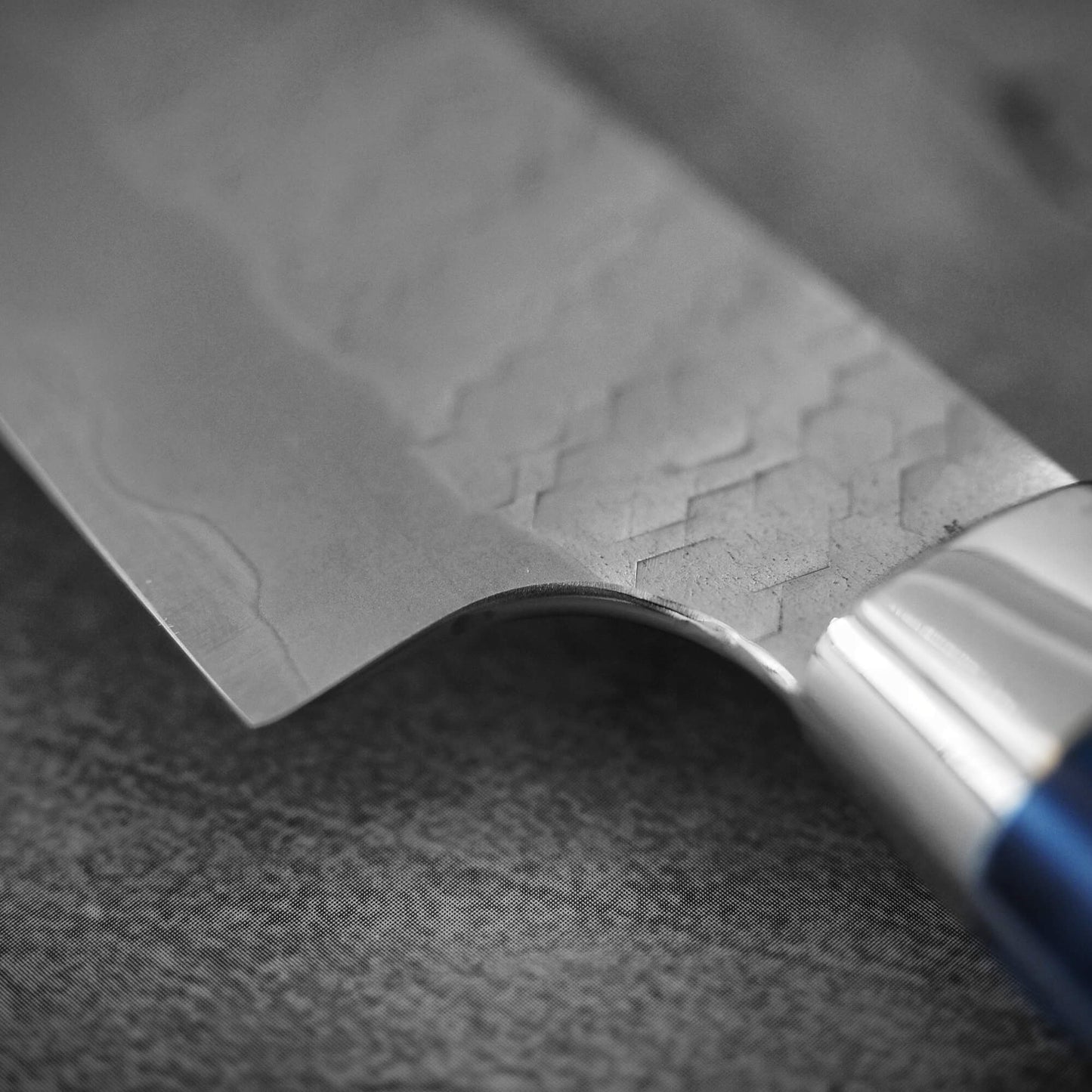 Close up view of Nigara tsuchime SG2 kiritsuke petty knife 150mm showing choil
