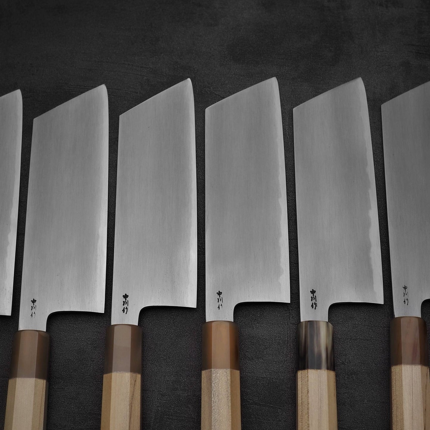 A group photo of multiple Nakagawa bokashi shirogami#1 ktip nakiri knives