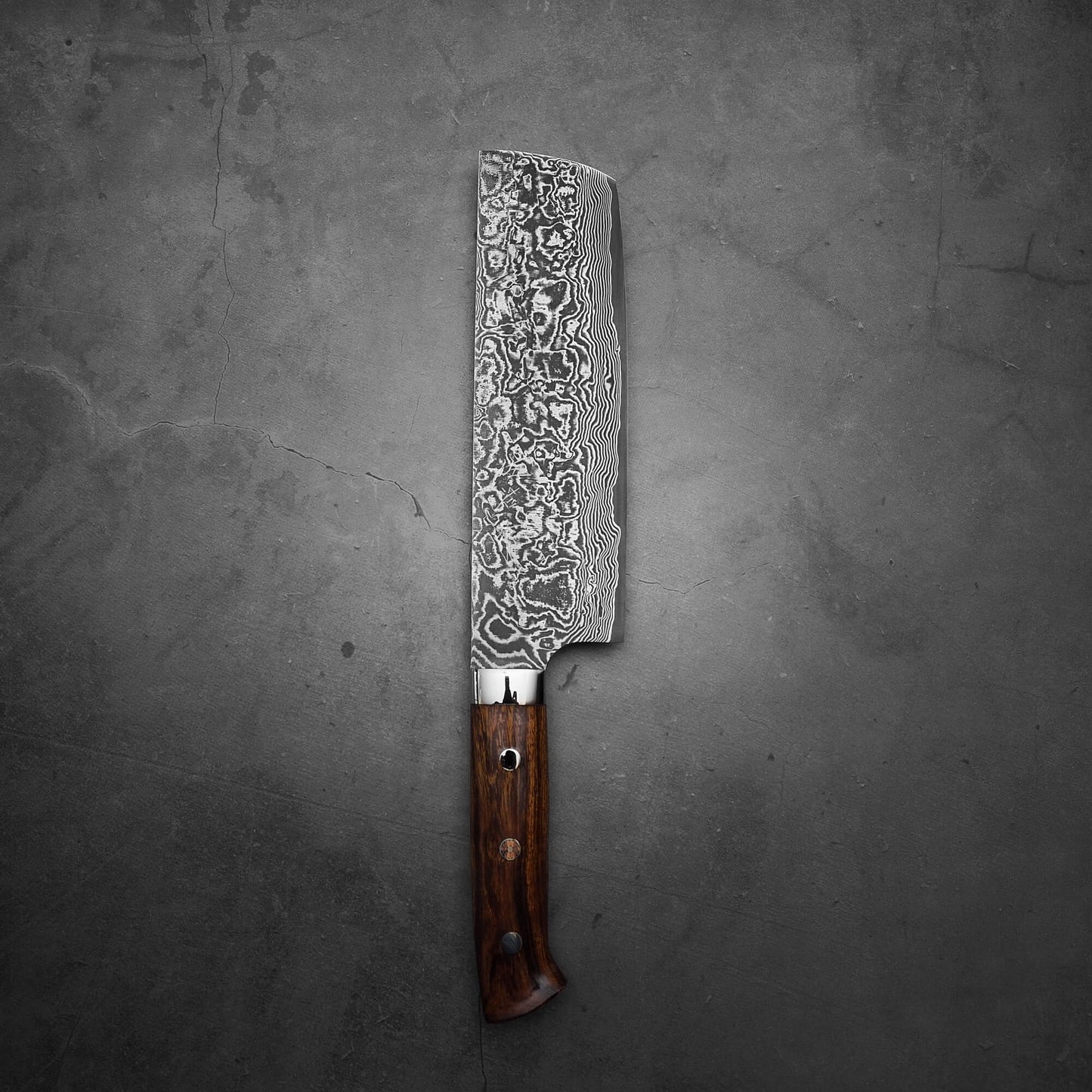 Top view of Takeshi Saji black damascus SG2 nakiri ironwood in vertical position