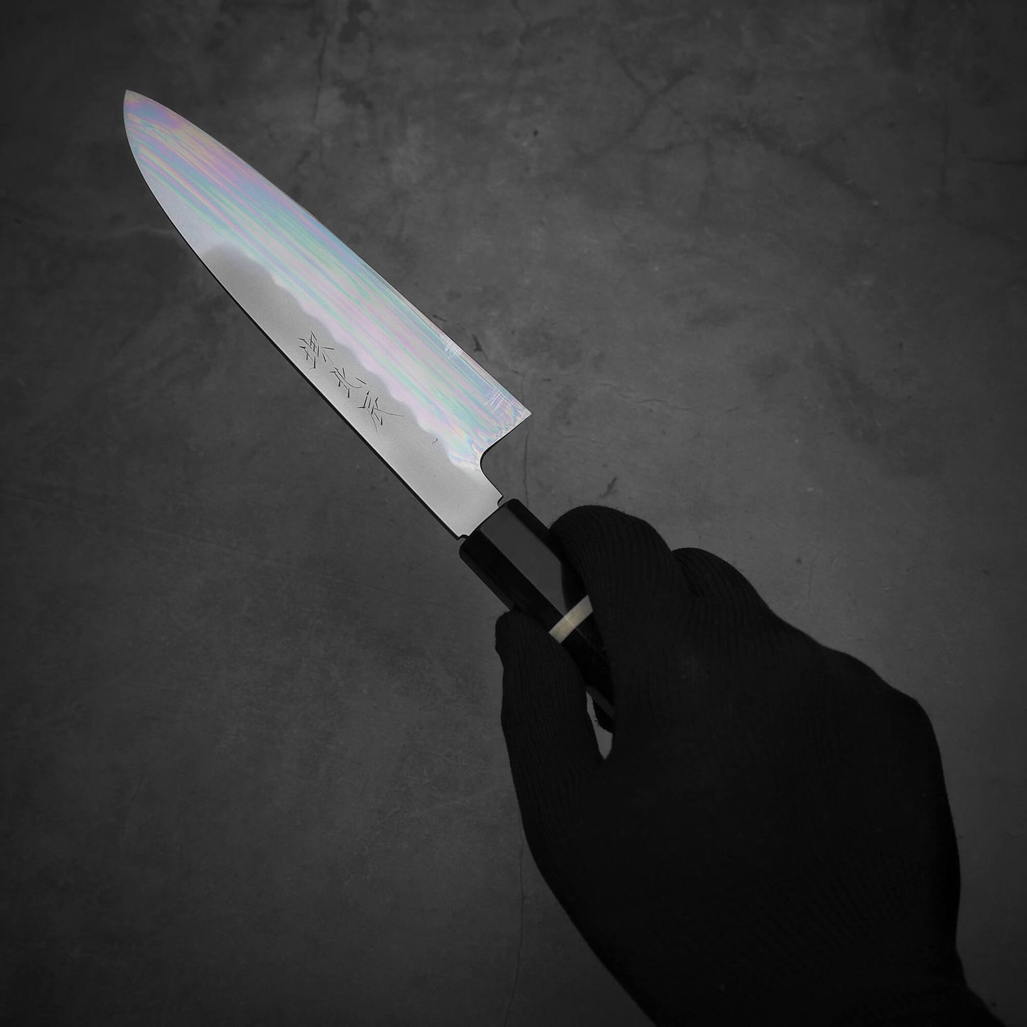 Hand holding Yoshikazu Ikeda shirogami#3 santoku 165mm