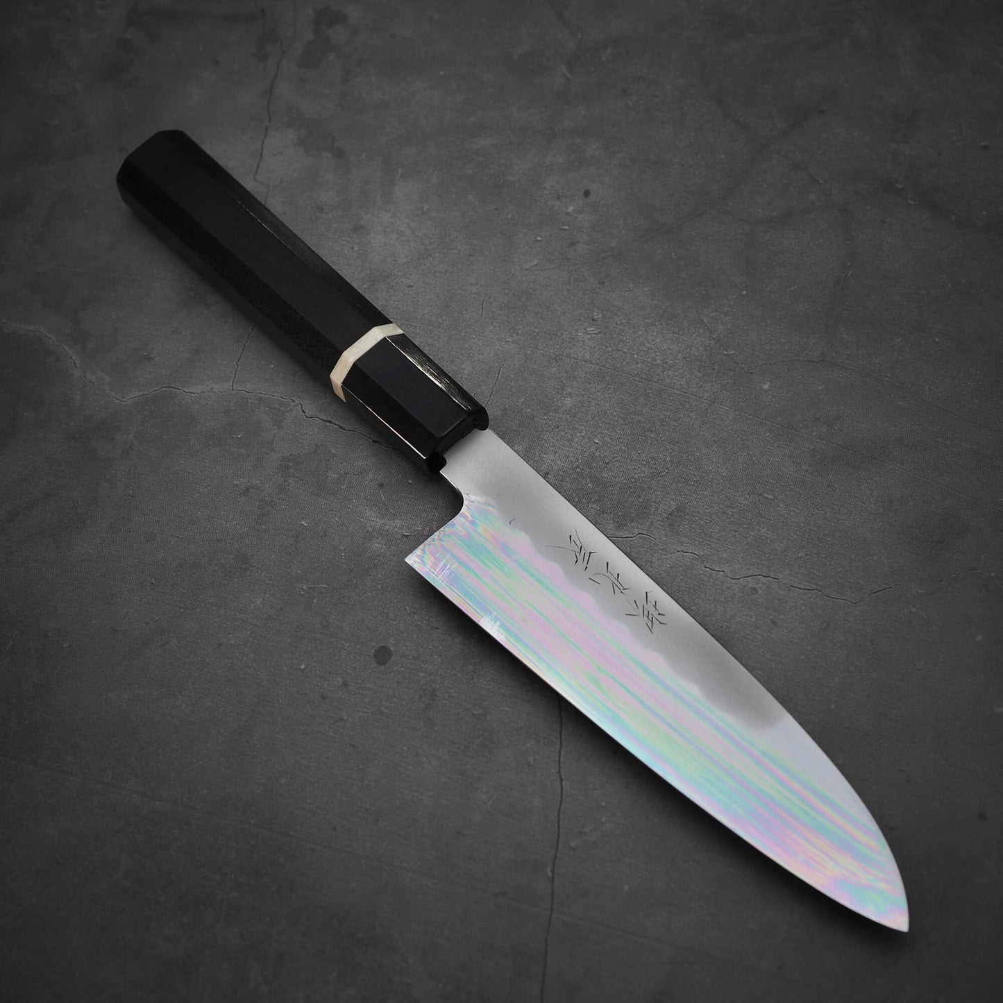Top view of Yoshikazu Ikeda shirogami#3 santoku 165mm where tip faces the bottom right