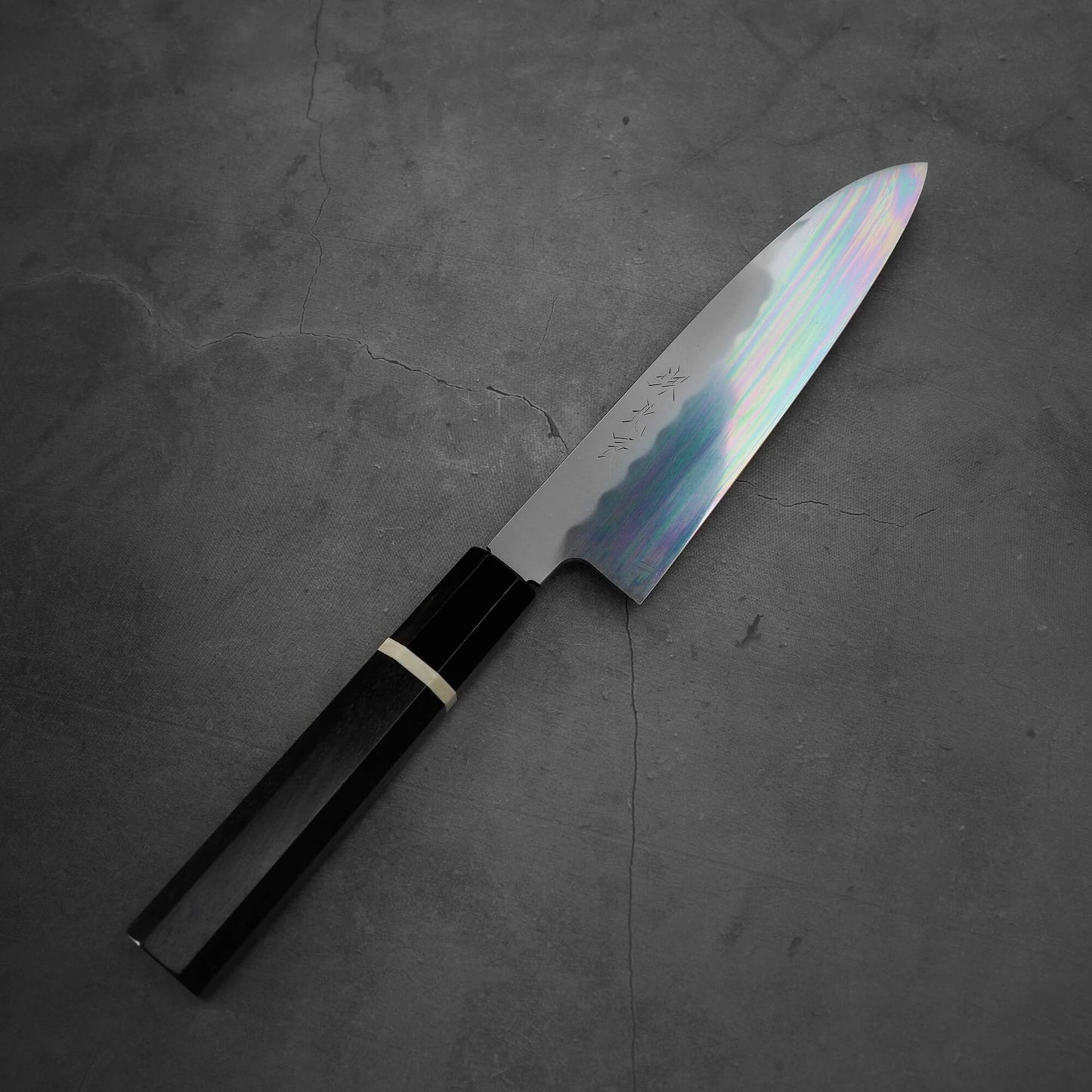 Top view of Yoshikazu Ikeda shirogami#3 santoku 165mm where the tip faces the upper right