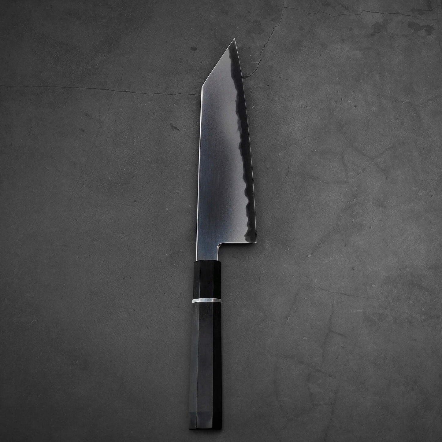 Top down view of Yoshikazu Tanaka AS bunka. This hand-forged Japanese knife is made of aogami super steel.
