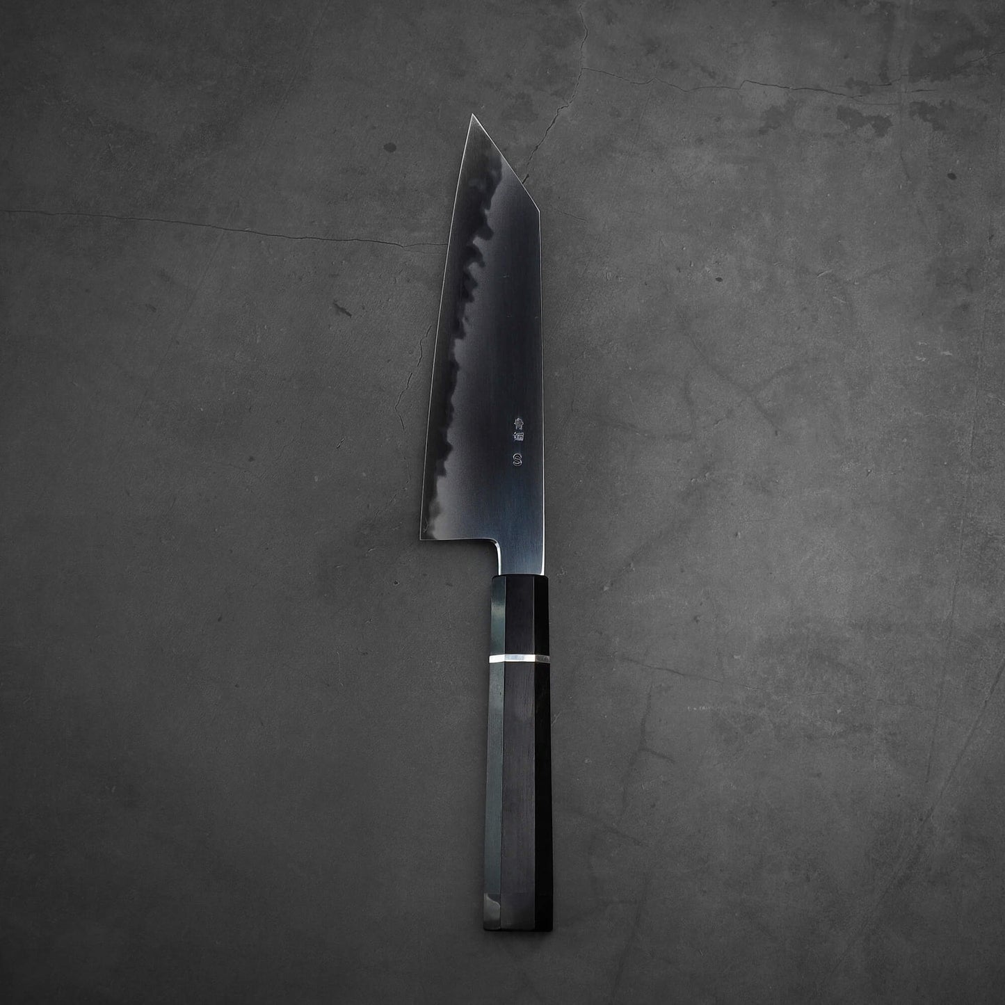 Top down view of Yoshikazu Tanaka AS bunka. This hand-forged Japanese knife is made of aogami super steel.