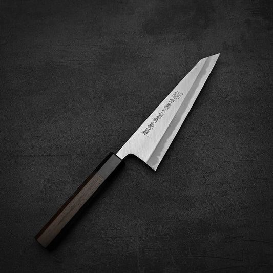 The Yoshikazu Tanaka shirogami#1 double bevel honesuki 170x50, crafted from premium steel with a wooden handle and Yoshikazu Tanakas mark etched on the blade, rests on a dark textured surface.