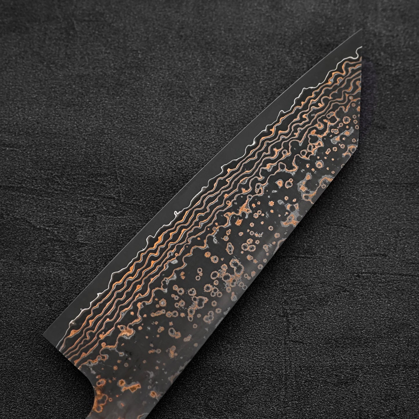 Back side of Takeshi Saji VG10 Gold damascus bunka knife