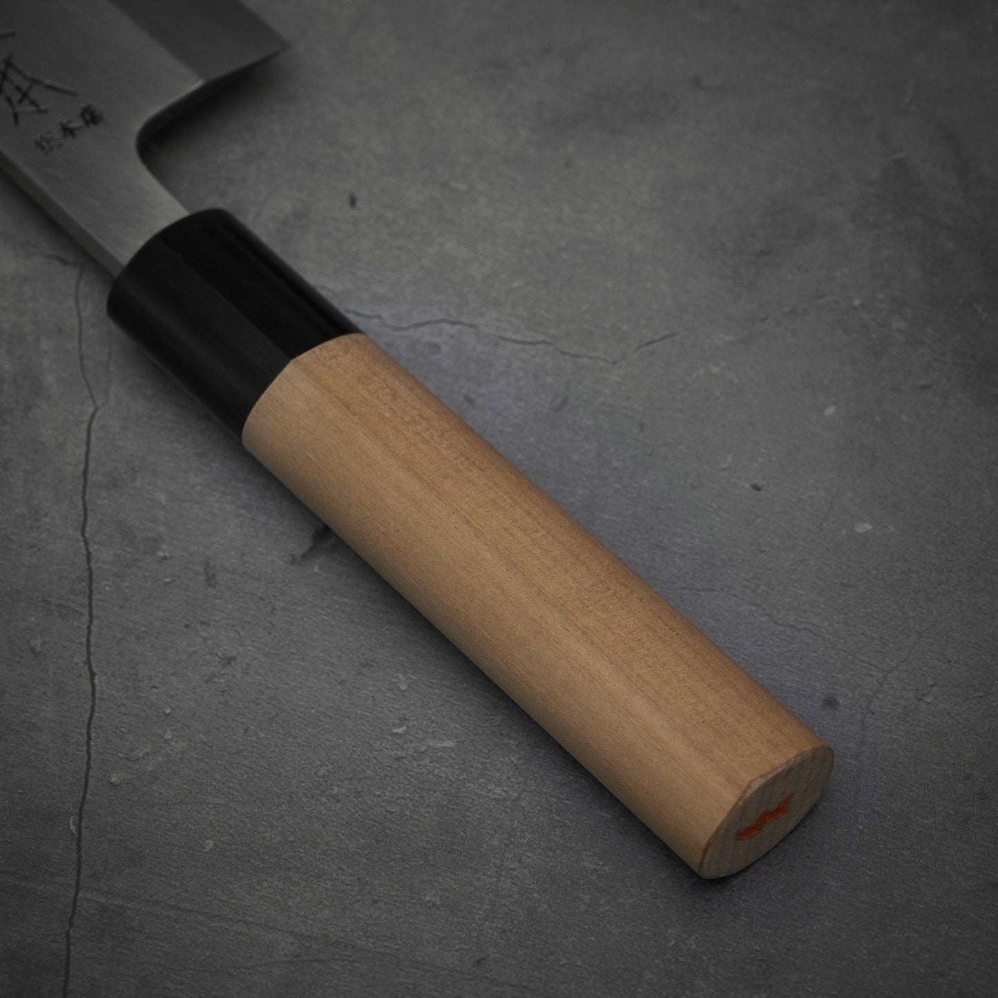 Close up view of the handle of Masamoto KS shirogami#2 ai-deba knife
