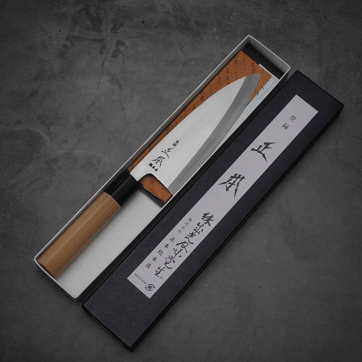 Top view of Masamoto KS shirogami#2 deba knife in its box