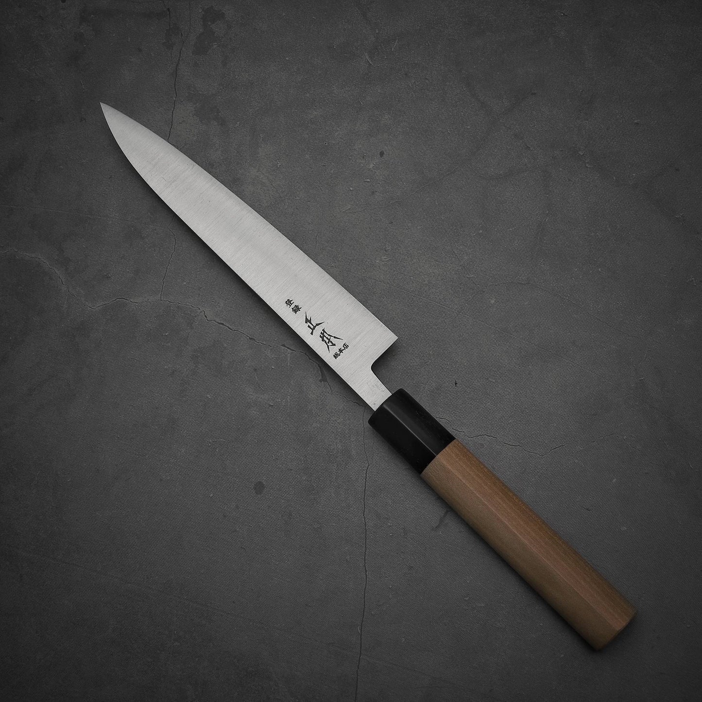 Top view of Masamoto KS shirogami#2 petty knife. Pointed tip is facing towards upper left