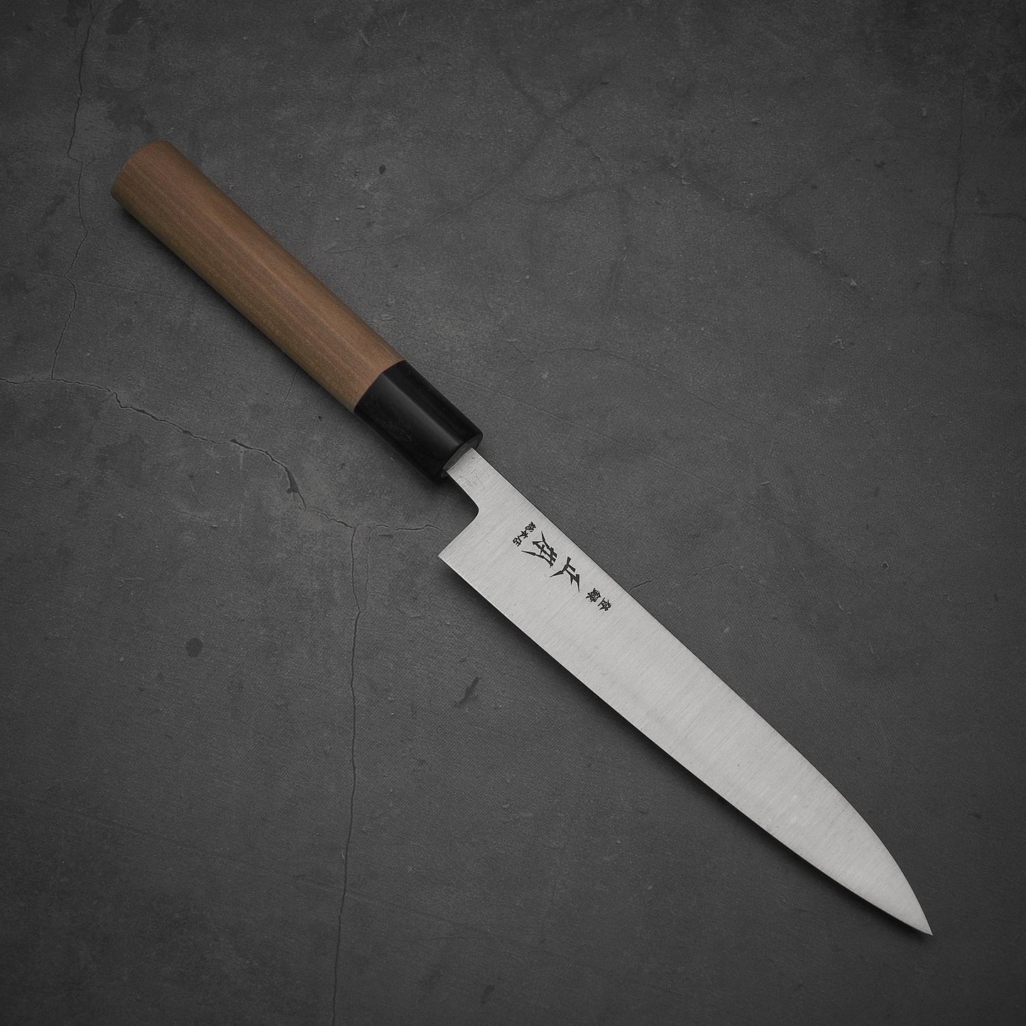 Top view of Masamoto KS shirogami#2 petty knife. Pointed tip is facing towards lower right