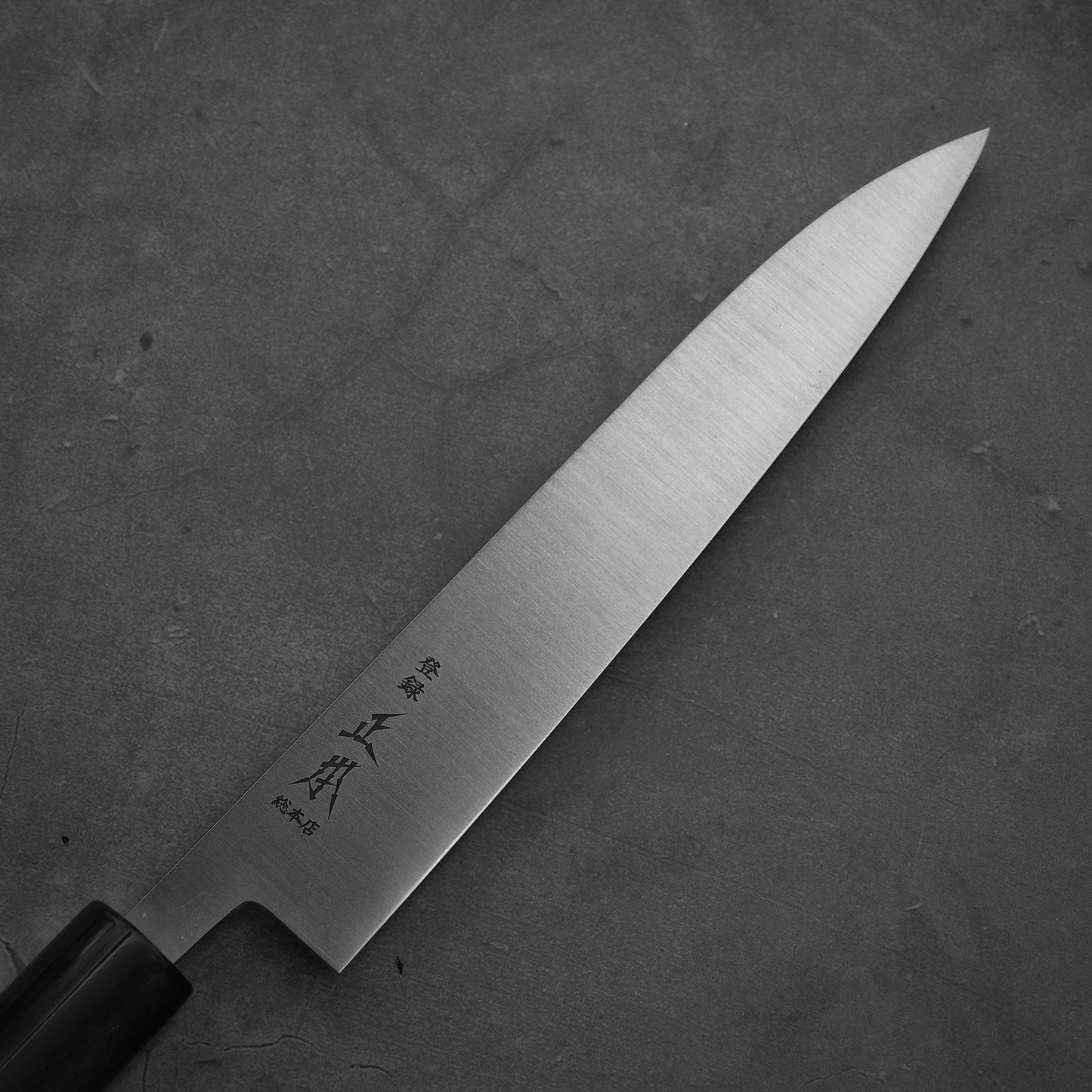 Close up view of the blade of Masamoto KS shirogami#2 petty knife.