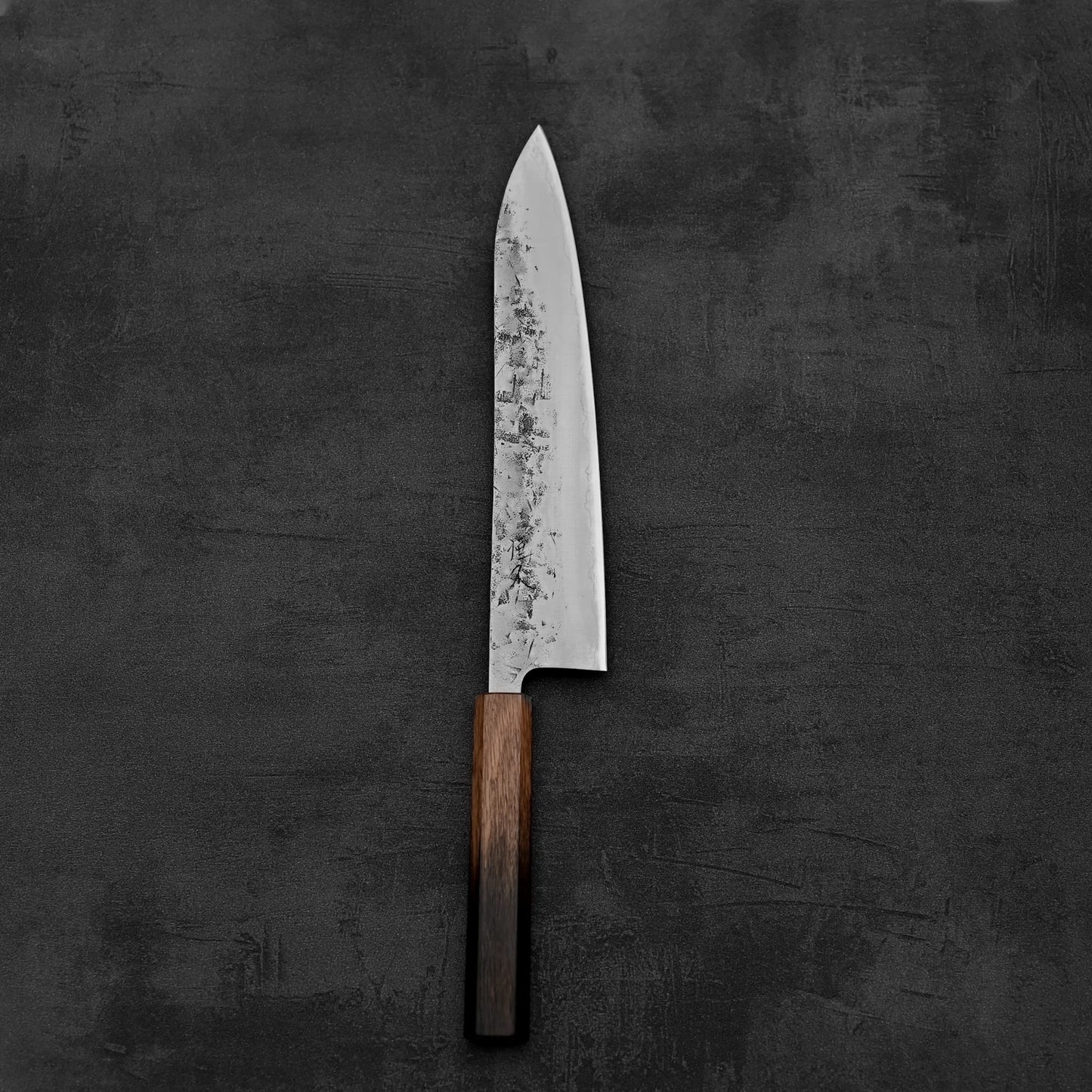 Top down view of Tsunehisa nashiji SLD gyuto knife in vertical position