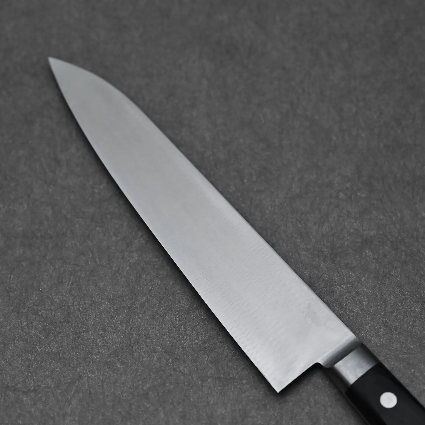 Close-up shot of the Masahiro blade showing the back side