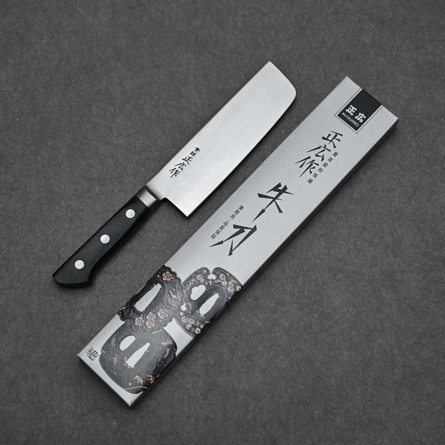 Complete blade profile of the Masahiro veggie knife with its box beside it