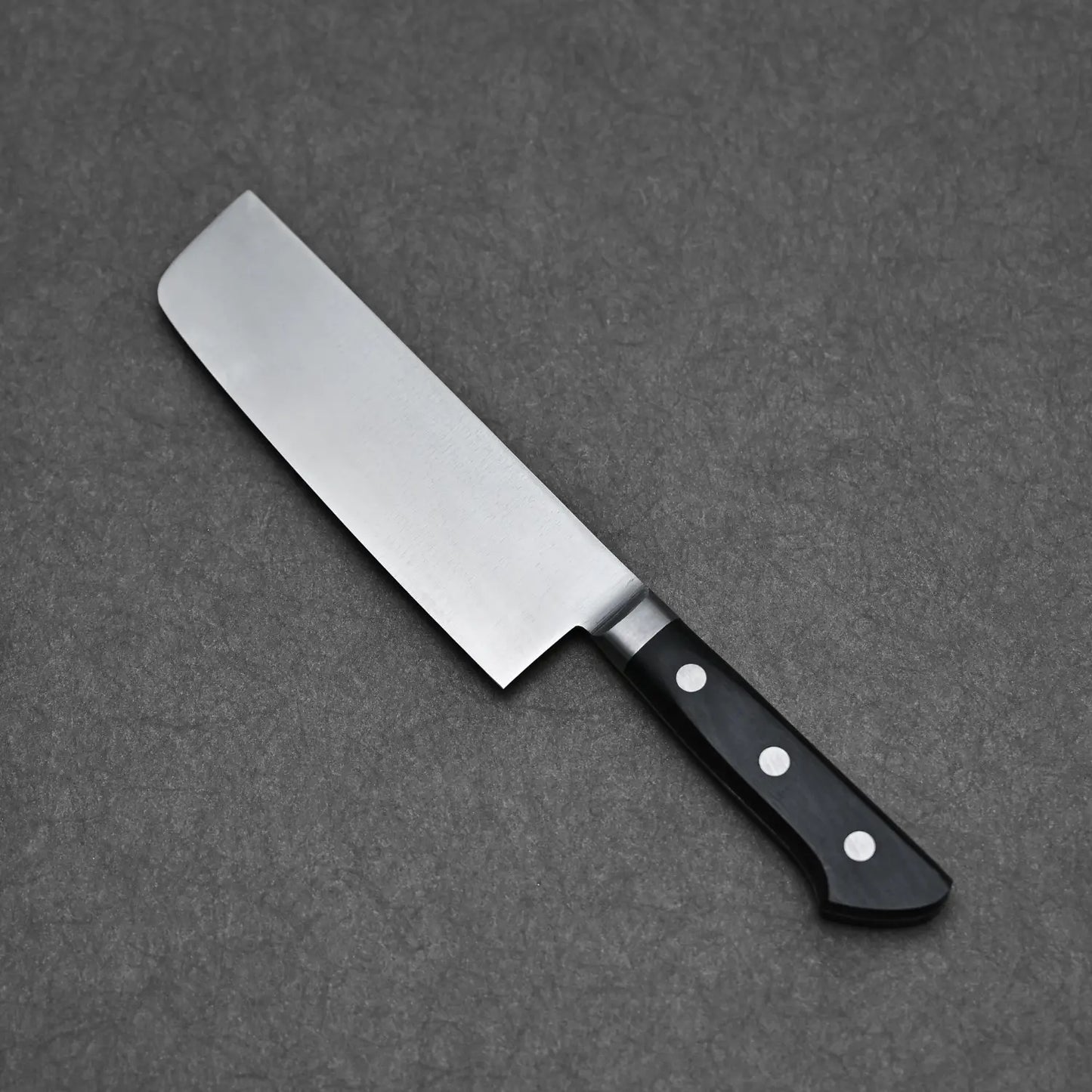 Angled view of the Masahiro vegetable kitchen knife showing blade profile