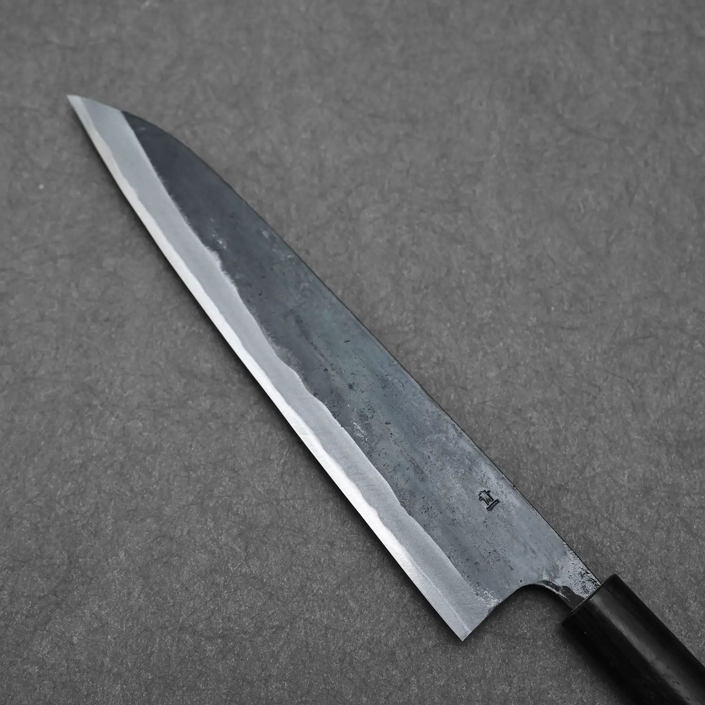 Close-up shot of the back side showing the blue#1 stamp of the Ohishi gyuto