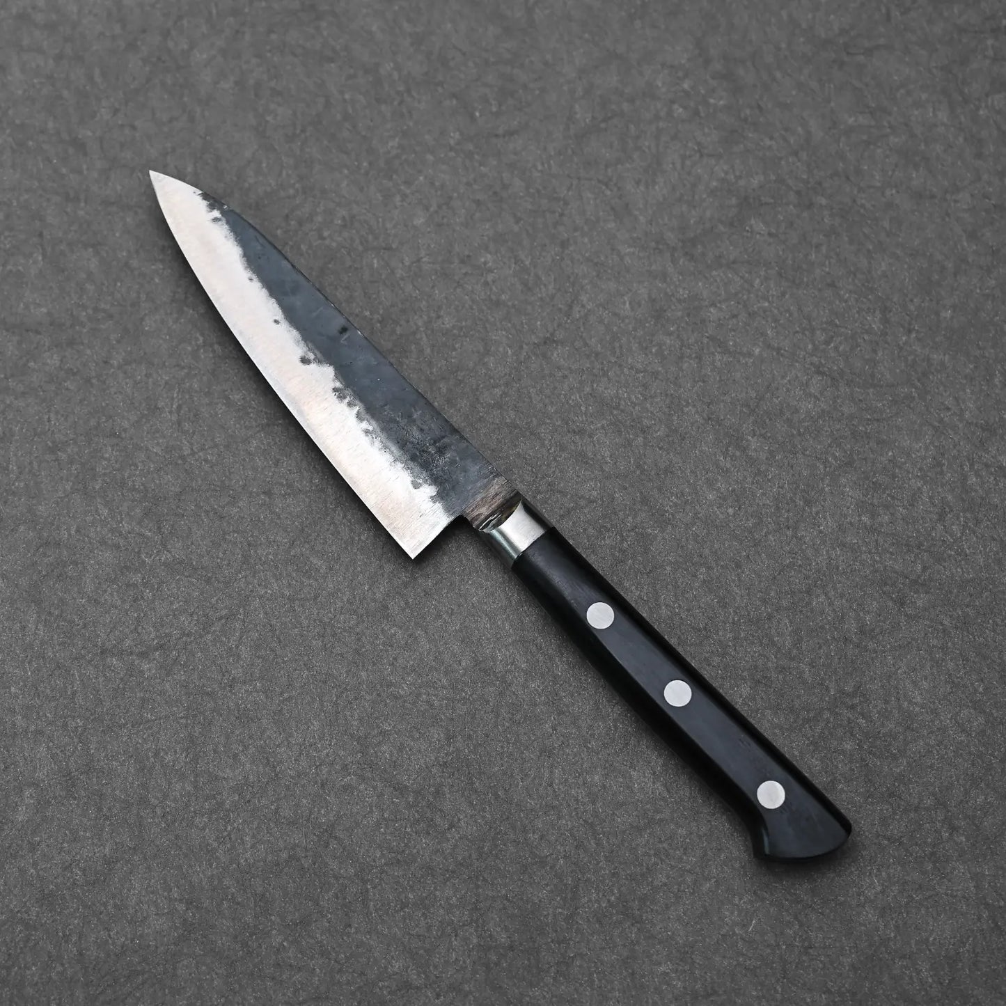 Full profile view of the denka 120mm petty showing the opposite side