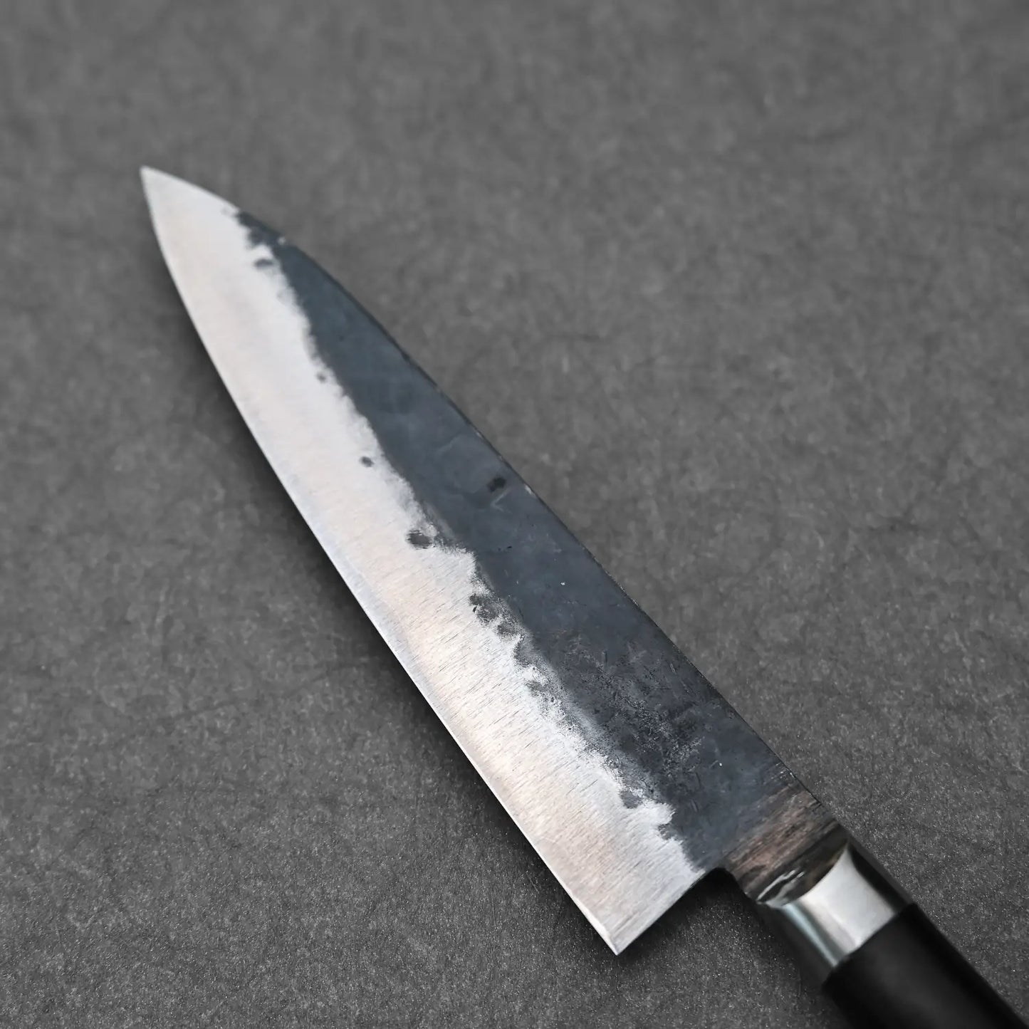 Close-up view of the back side of the 120mm denka petty
