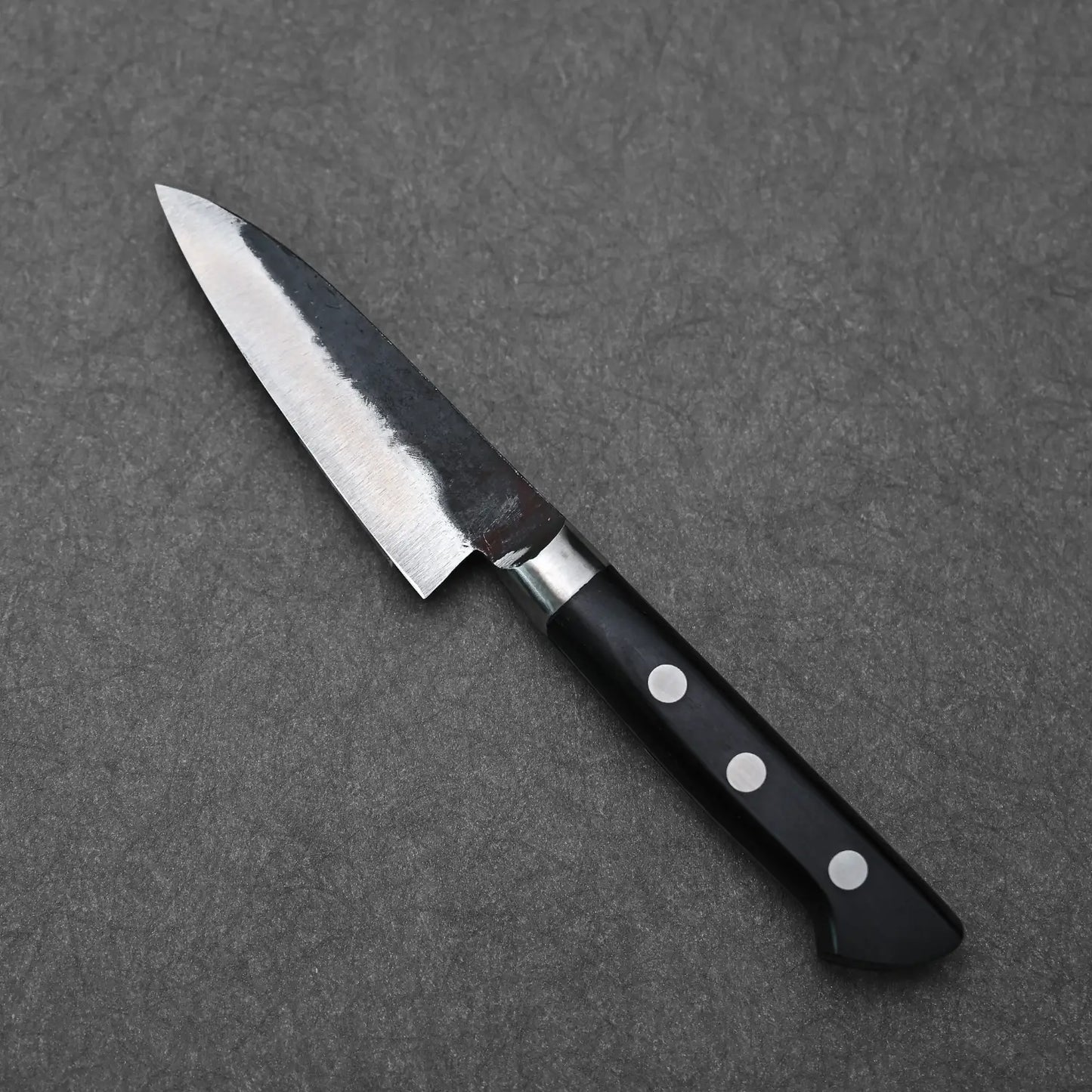 Full profile view of the denka petty knife showing the opposite side