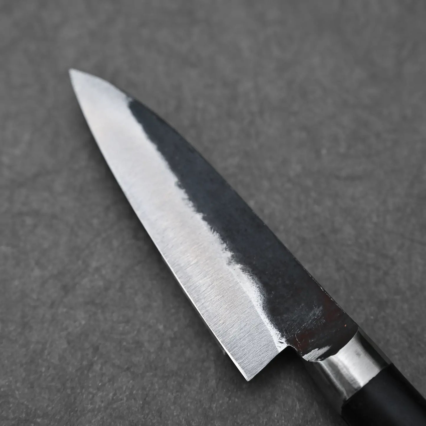 Close-up view of the back side of denka petty knife
