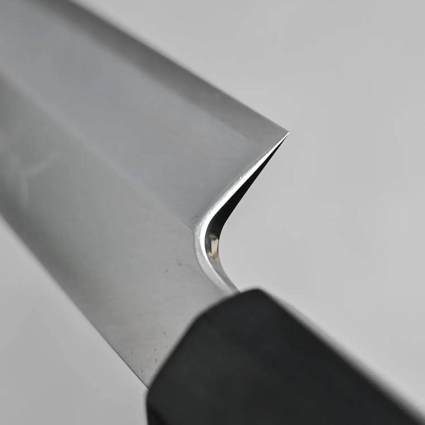 Close-up shot of the choil finish on the ktip yanagi