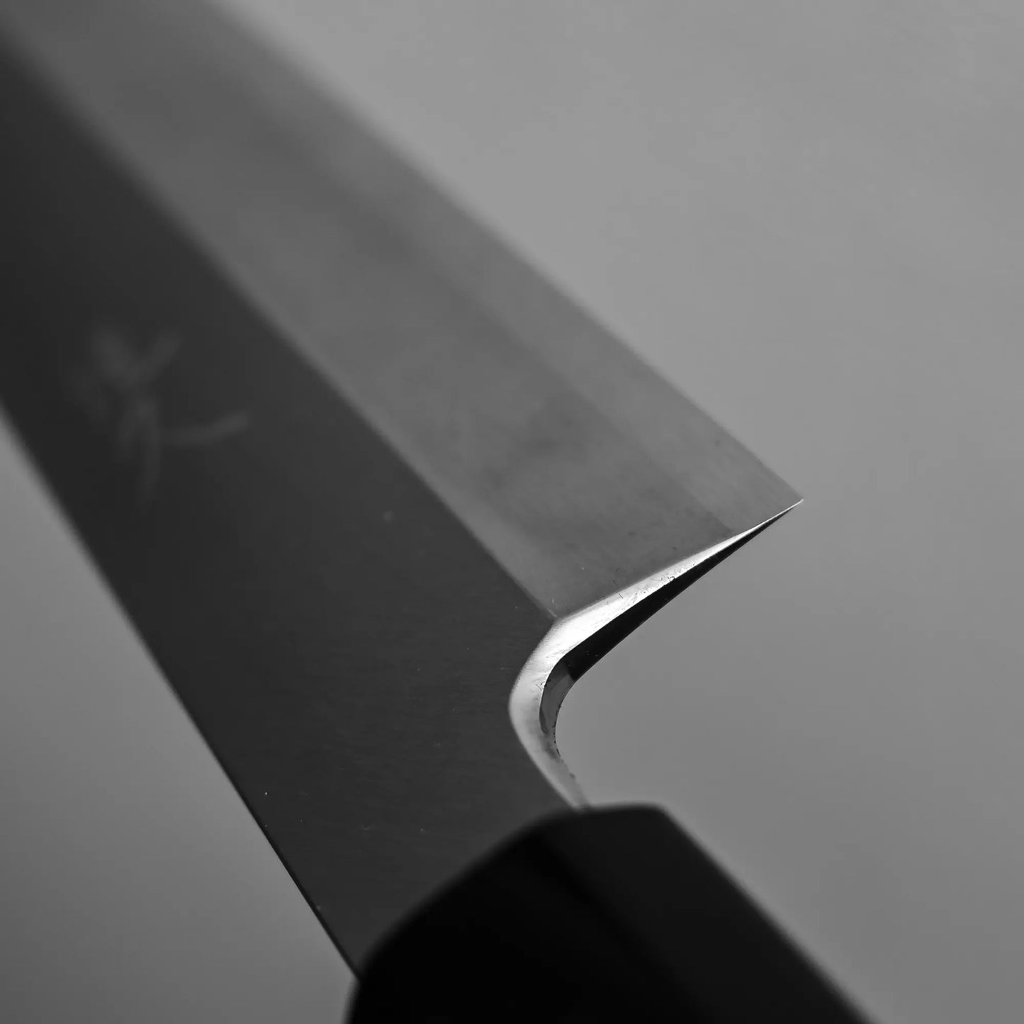 Close-up shot of the high polish on ginsan kitchen knife