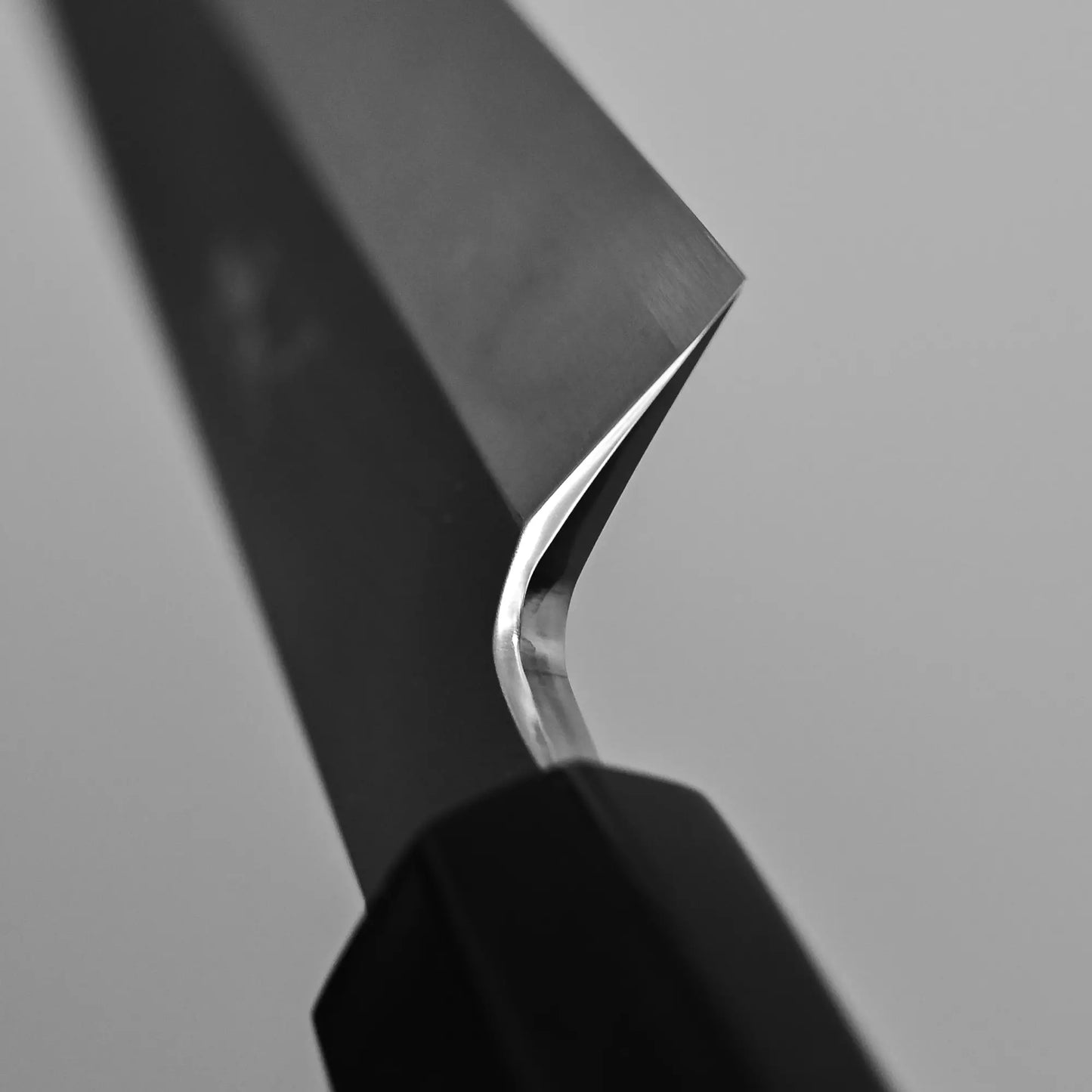 Close-up shot of the choil finish on the Japanese knife