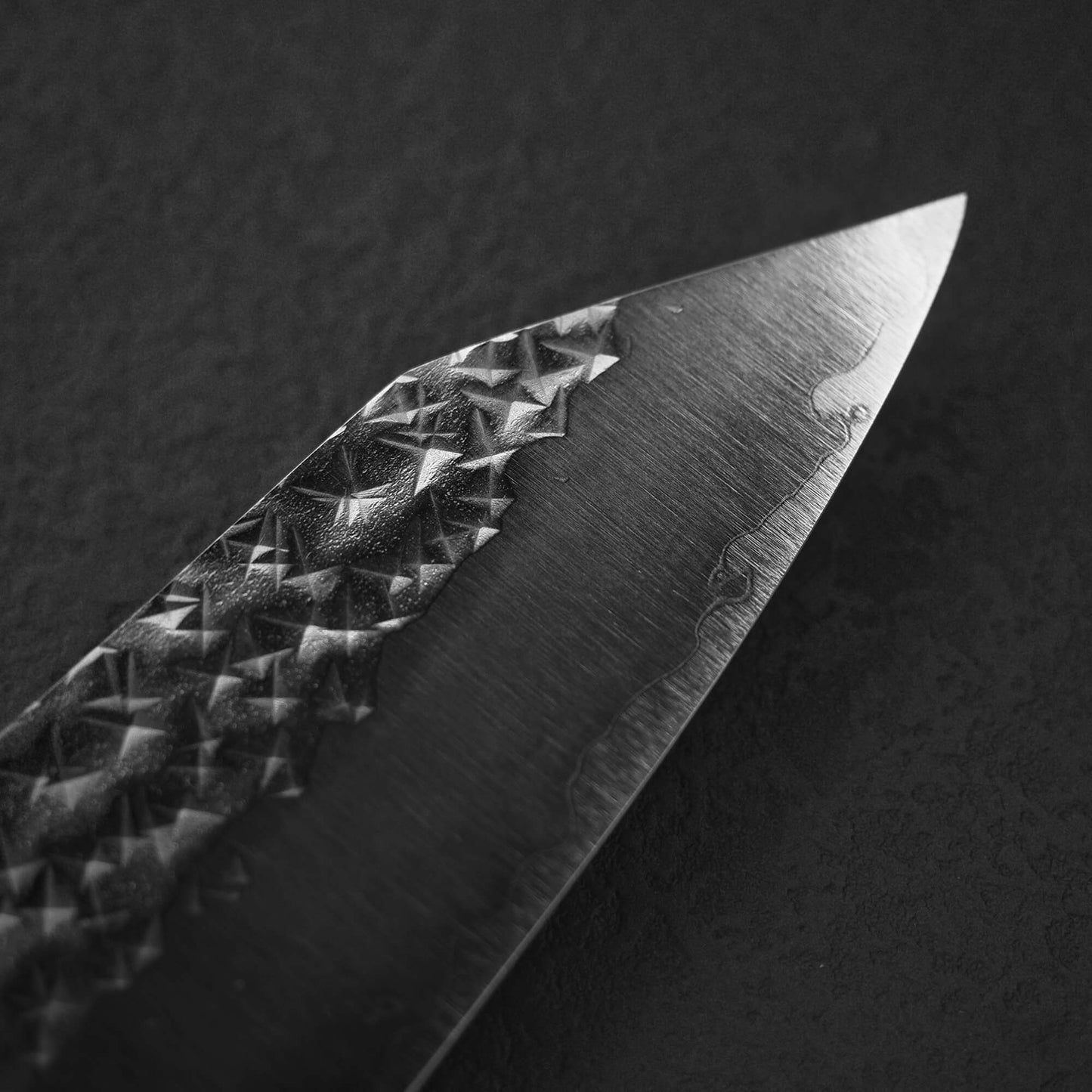 Close up view of the tip area of the front blade of Yu Kurosaki SG2 Senko bunka 165mm
